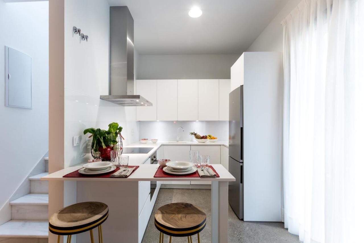 Apartamentos Rg Plaza De Espana Севілья Екстер'єр фото